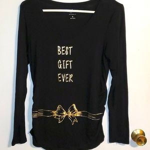 A-glow maternity shirt. Black with gold print bow around waistline